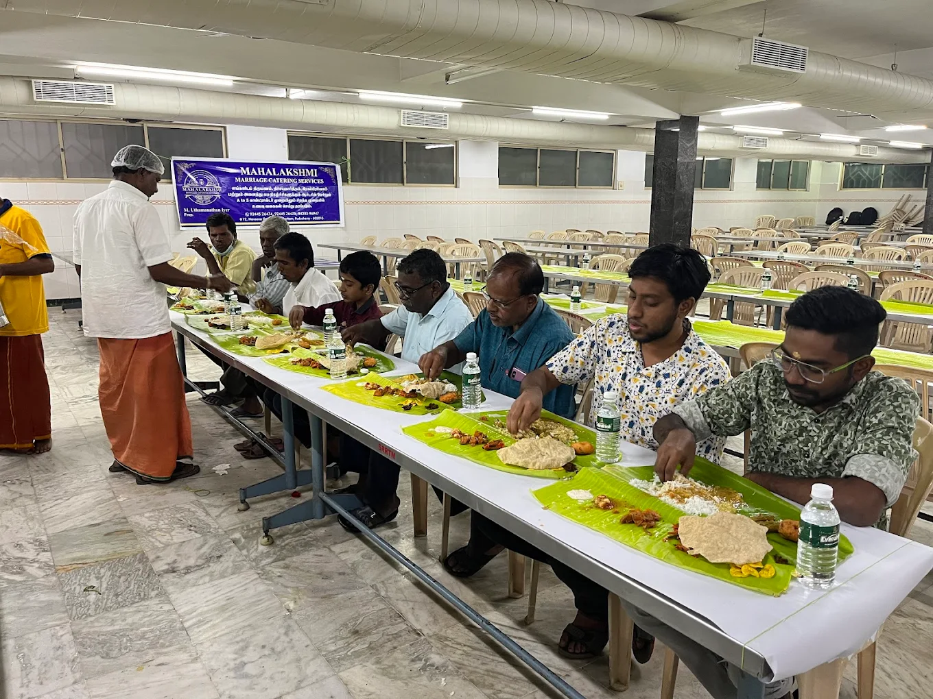 Serving food on banana leaf with flowers